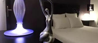 La chambre à coucher d'Escapade Coquine