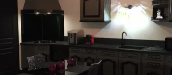 Cuisine entièrement équipée pour concocter de bons petits plats - Escapade Coquine